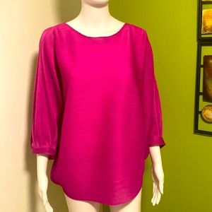 Beautiful, fuchsia quarter length dolman sleeve blouse.